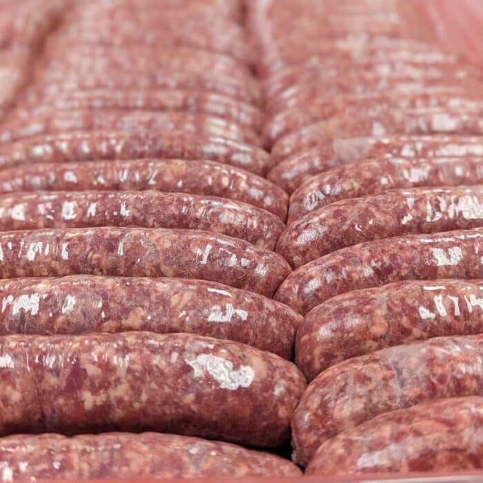 A group of boerewors sausage links in a line