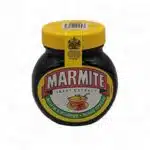 A black jar of marmite spread vegetable extract with a yellow lid