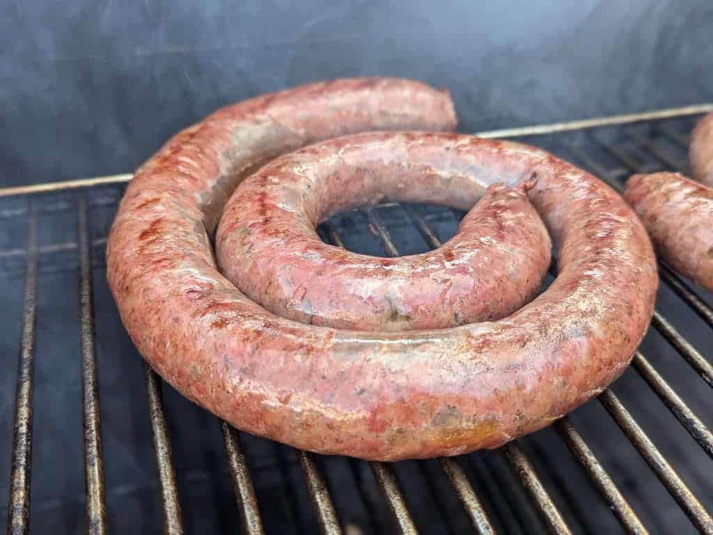 Spiral boerewors cooking on grill