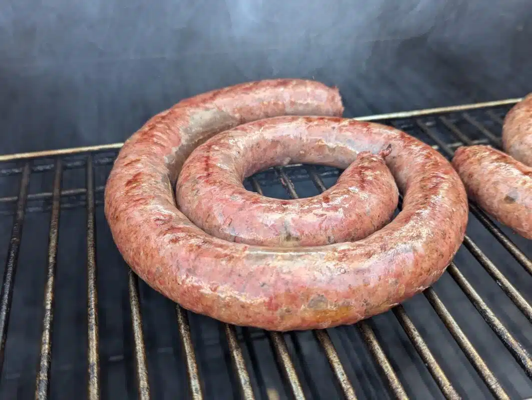 Coiled boerewors on a grill