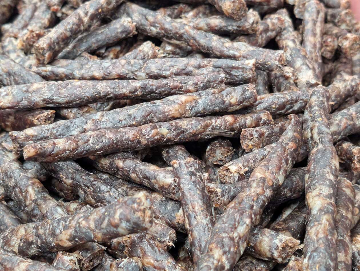Thin, dried meat snack sticks.
