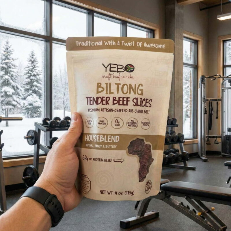 Biltong High Protein Snacks in a bag with a gym in the background