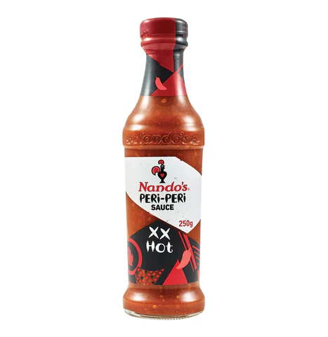 Nando’s XX Hot Peri-Peri Sauce bottle with fiery chili flavor and bold packaging.